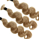 Three bundles of medium blonde bulk human hair for braiding details body wave